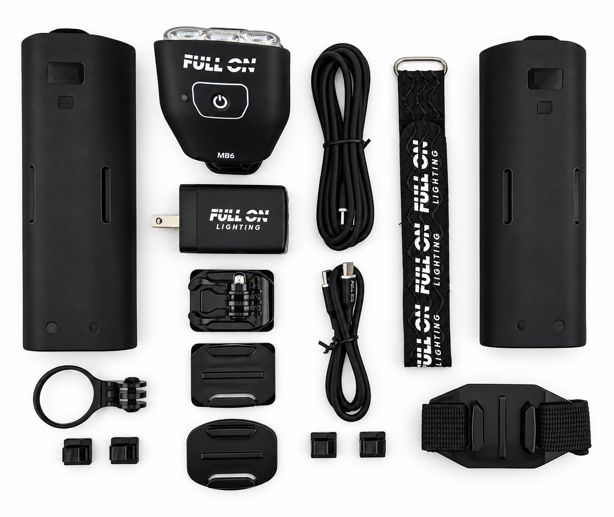 MB6 Pro light with two batteries, USB-C cables, fast charger, mounts, strap and four cable guides